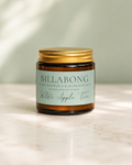 Wilde Apple Tree Billabong mini soy candle in amber glass jar with sage green label on marble surface, Kakadu waterlilly and Australian bush scent, handcrafted soy candle made in Australia