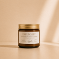 Wilde Apple Tree Delight mini soy candle in amber glass jar with gold lid, photographed in warm studio light, wild honeysuckle and cashmere handcrafted soy candle made in Australia